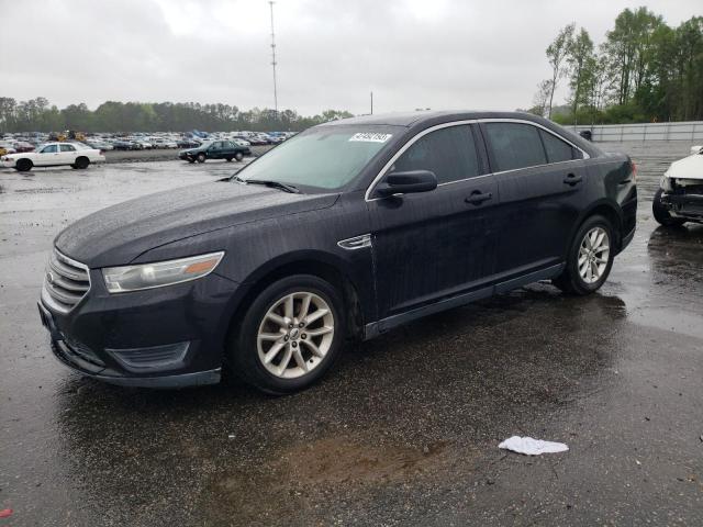 FORD TAURUS SE 2014 with VIN 1FAHP2D89EG143270 - Photo from auction