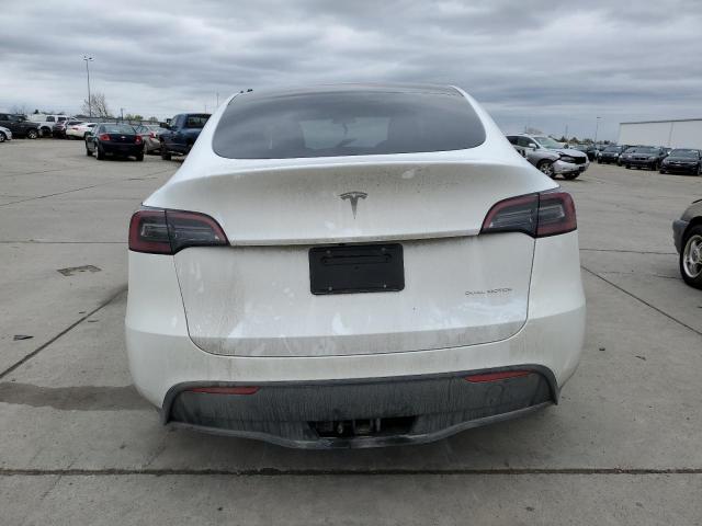 Photo 6 from auction – 2023 TESLA MODEL Y with VIN 7SAYGDEE1PF637178