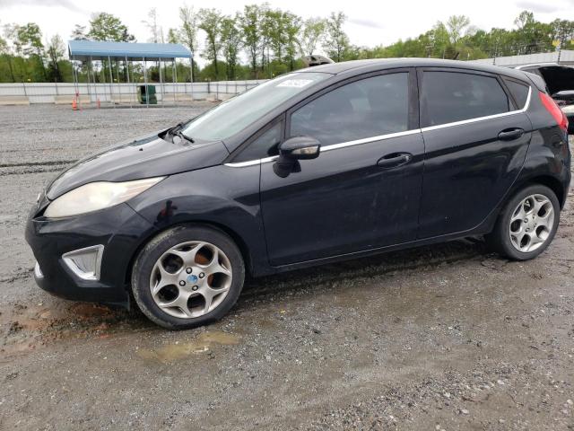 FORD FIESTA SES 2011 with VIN 3FADP4FJ6BM127183 - Photo from auction