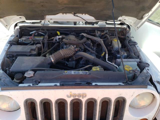 Photo 11 from auction – 2011 JEEP WRANGLER S with VIN 1J4AA5D19BL638129