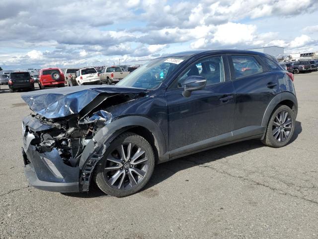 MAZDA CX-3 TOURI 2018 with VIN JM1DKFC76J1304551 - Photo from auction