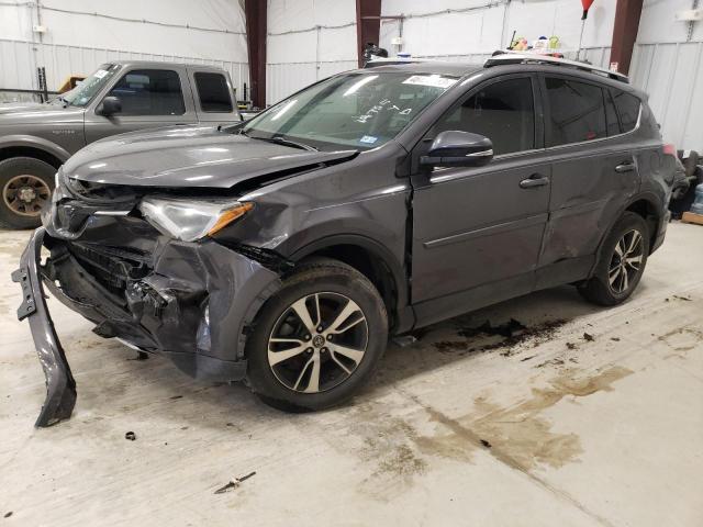 TOYOTA RAV4 XLE 2016 with VIN 2T3WFREV3GW311557 - Photo from auction