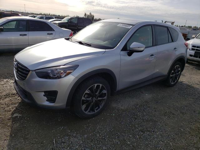 MAZDA CX-5 GT 2016 with VIN JM3KE4DY9G0613141 - Photo from auction