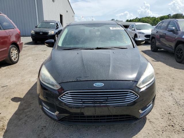 Photo 5 from auction – 2015 FORD FOCUS TITA with VIN 1FADP3N23FL298405
