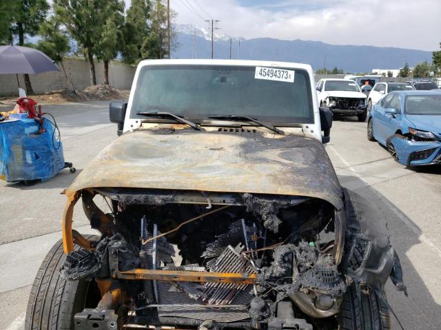Photo 5 from auction – 2015 JEEP WRANGLER U with VIN 1C4BJWDG8FL761205