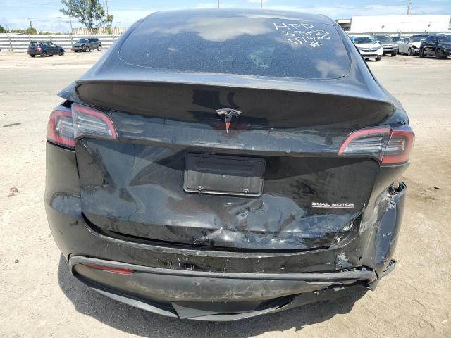 Photo 6 from auction – 2022 TESLA MODEL Y with VIN 7SAYGDEFXNF499906