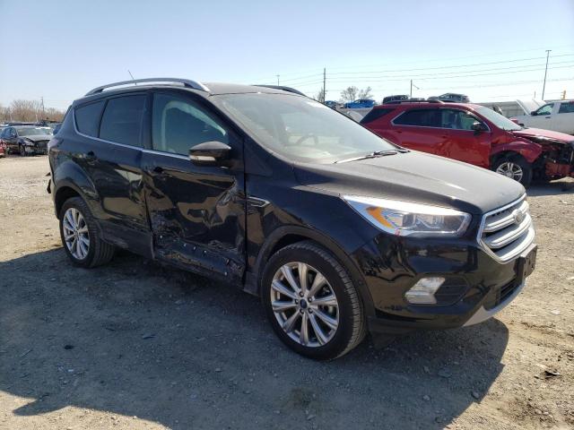 Photo 4 from auction – 2018 FORD ESCAPE TIT with VIN 1FMCU9J96JUC34636