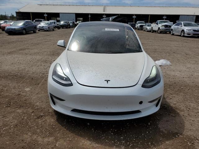Photo 5 from auction – 2022 TESLA MODEL 3 with VIN 5YJ3E1EB0NF110411