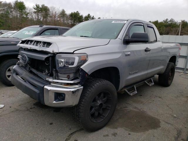 TOYOTA TUNDRA DOU 2014 with VIN 5TFUY5F19EX384902 - Photo from auction