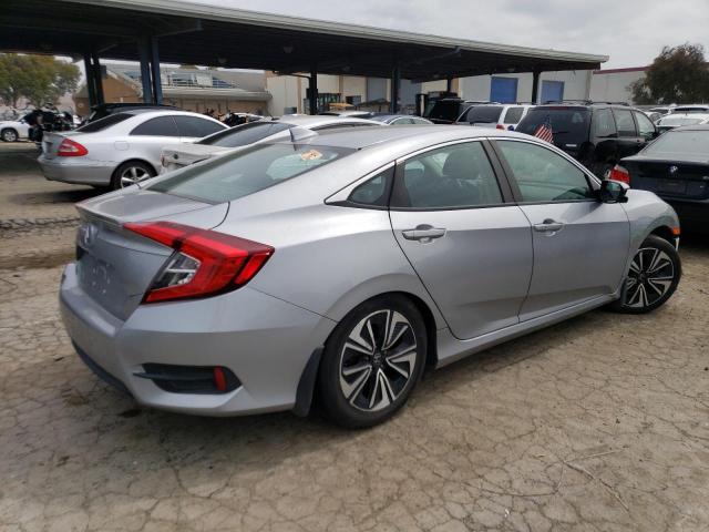Photo 3 from auction – 2018 HONDA CIVIC EX with VIN 19XFC1E36JE003620