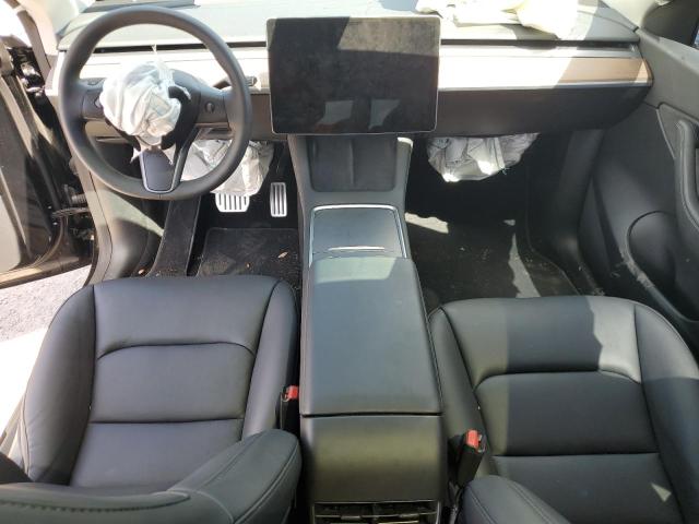 Photo 8 from auction – 2022 TESLA MODEL Y with VIN 7SAYGDEFXNF499906