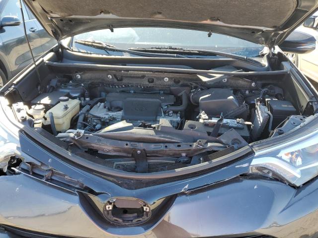 Photo 12 from auction – 2018 TOYOTA RAV4 SE with VIN JTMJFREV3JJ727902