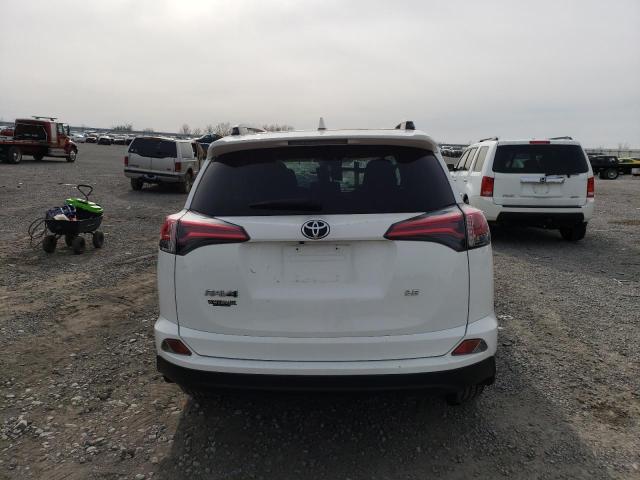Photo 6 from auction – 2018 TOYOTA RAV4 LE with VIN JTMZFREV8JJ727784