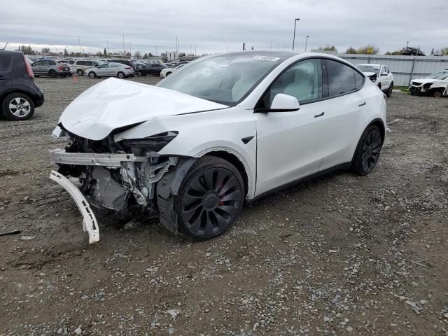 TESLA MODEL Y 2022 with VIN 7SAYGDEF7NF340566 - Photo from auction
