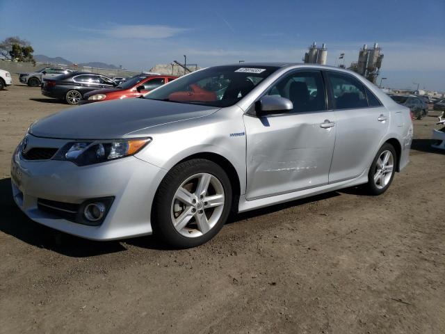 TOYOTA CAMRY HYBR 2014 with VIN 4T1BD1FK5EU132209 - Photo from auction