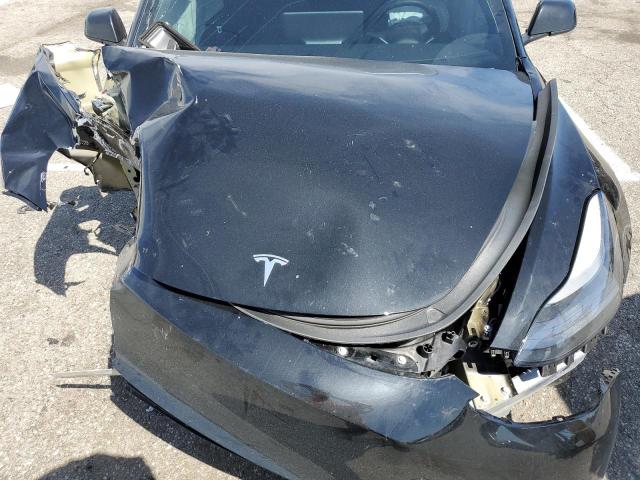 Photo 11 from auction – 2022 TESLA MODEL 3 with VIN 5YJ3E1EC6NF295928