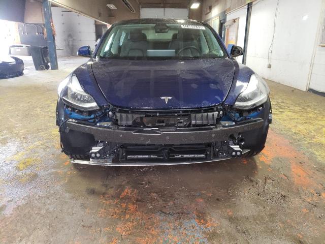Photo 5 from auction – 2022 TESLA MODEL 3 with VIN 5YJ3E1EAXNF371844