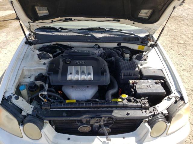 Photo 11 from auction – 2004 KIA OPTIMA LX with VIN KNAGD126145268927