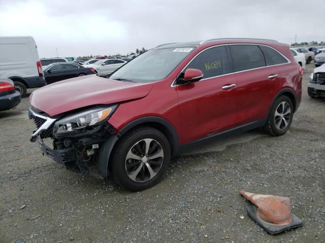 KIA SORENTO EX 2016 with VIN 5XYPH4A59GG100272 - Photo from auction