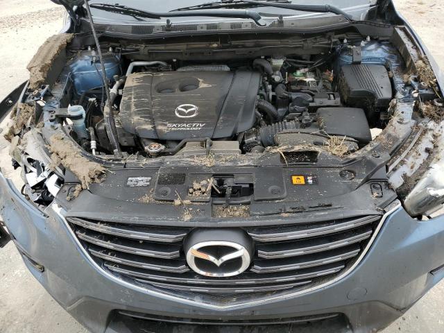 Photo 12 from auction – 2016 MAZDA CX-5 SPORT with VIN JM3KE2BY7G0791640