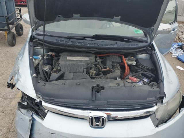 Photo 11 from auction – 2006 HONDA CIVIC HYBR with VIN JHMFA36226S011983