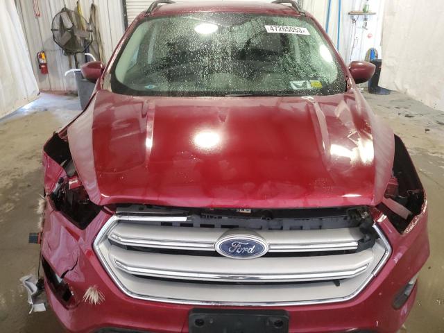 Photo 12 from auction – 2018 FORD ESCAPE SE with VIN 1FMCU9GD5JUA62062
