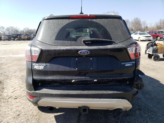 Photo 6 from auction – 2018 FORD ESCAPE TIT with VIN 1FMCU9J96JUC34636