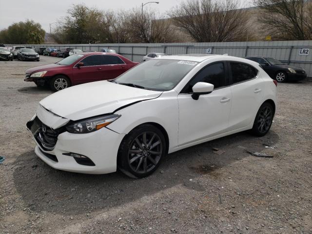 MAZDA 3 TOURING 2018 with VIN 3MZBN1L34JM263321 - Photo from auction