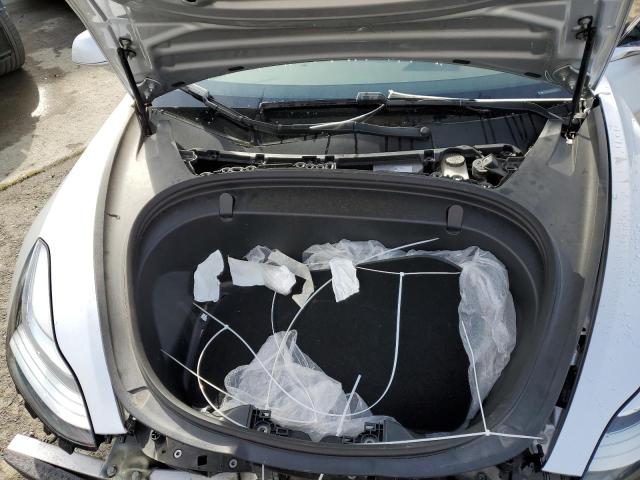Photo 11 from auction – 2018 TESLA MODEL 3 with VIN 5YJ3E1EAXJF041521