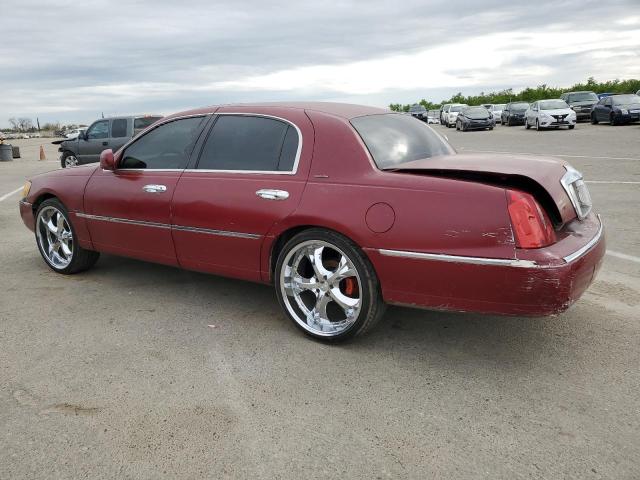 Photo 2 from auction – 1998 LINCOLN TOWN CAR E with VIN 1LNFM81W9WY644750
