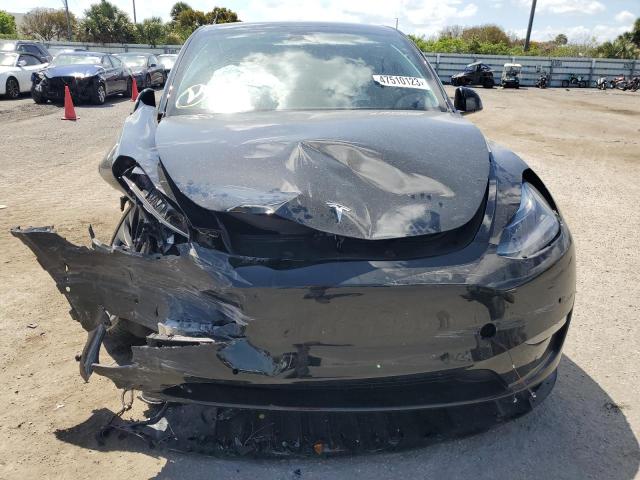 Photo 5 from auction – 2022 TESLA MODEL Y with VIN 7SAYGDEFXNF499906