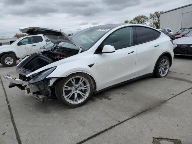 TESLA MODEL Y 2023 with VIN 7SAYGDEE1PF637178 - Photo from auction