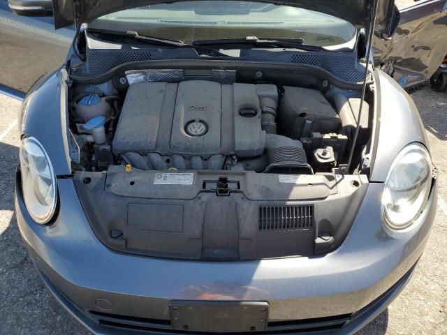 Photo 11 from auction – 2014 VOLKSWAGEN BEETLE with VIN 3VWJP7AT1EM606653