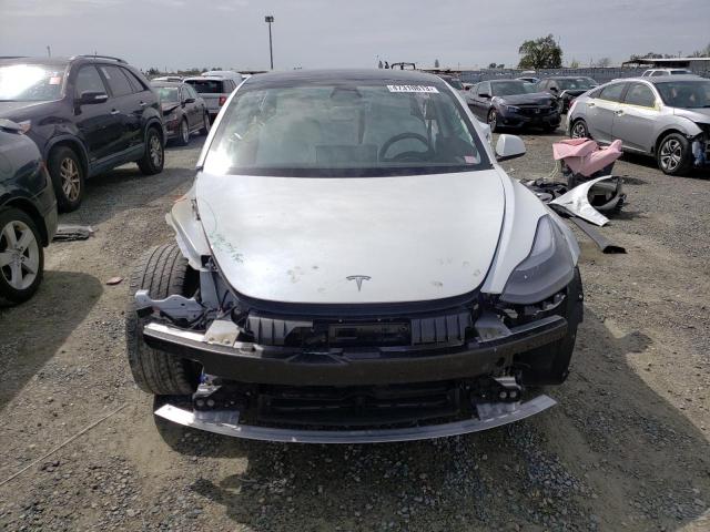 Photo 5 from auction – 2021 TESLA MODEL 3 with VIN 5YJ3E1EB1MF067535