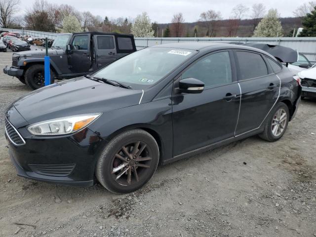 FORD FOCUS SE 2016 with VIN 1FADP3F22GL368217 - Photo from auction
