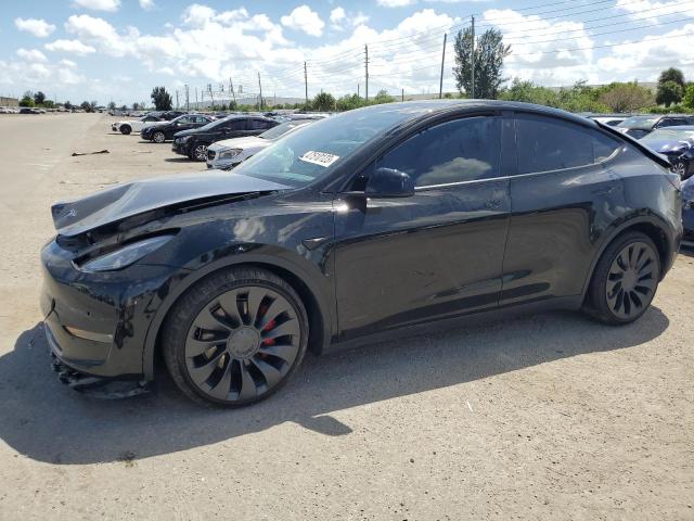 TESLA MODEL Y 2022 with VIN 7SAYGDEFXNF499906 - Photo from auction
