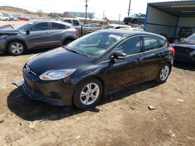 FORD FOCUS SE 2014 with VIN 1FADP3K27EL110570 - Photo from auction