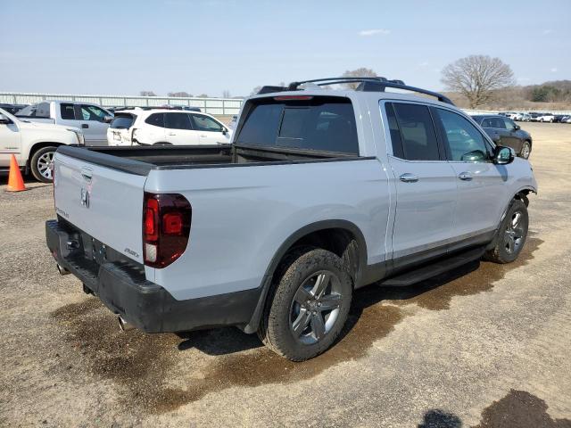 Photo 3 from auction – 2023 HONDA RIDGELINE with VIN 5FPYK3F77PB012460