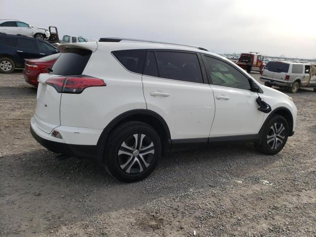 Photo 3 from auction – 2018 TOYOTA RAV4 LE with VIN JTMZFREV8JJ727784