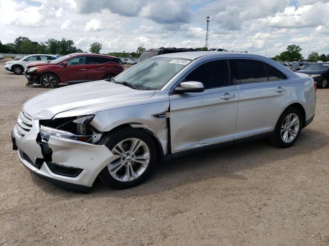 FORD TAURUS SEL 2014 with VIN 1FAHP2E89EG173707 - Photo from auction