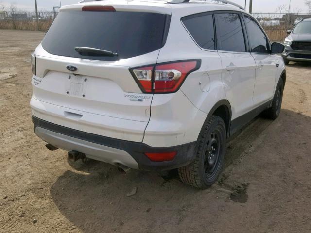 Photo 4 from auction – 2018 FORD ESCAPE TIT with VIN 1FMCU9J92JUA38189