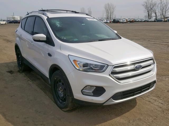 FORD ESCAPE TIT 2018 with VIN 1FMCU9J92JUA38189 - Photo from auction