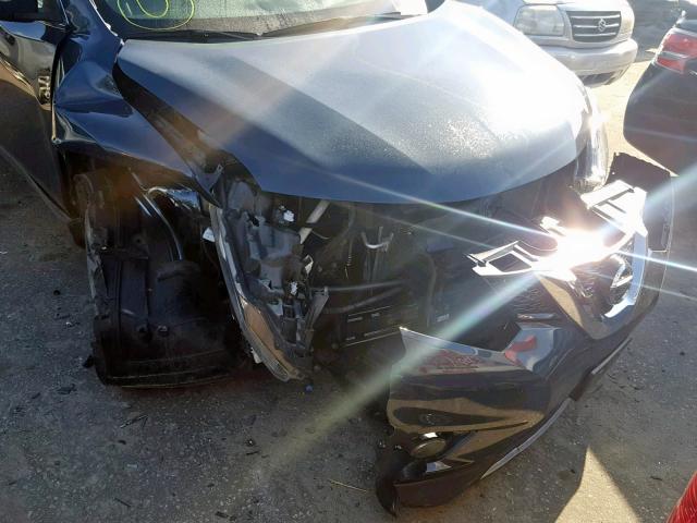 Photo 9 from auction – 2015 NISSAN ROGUE S with VIN 5N1AT2MV4FC828696