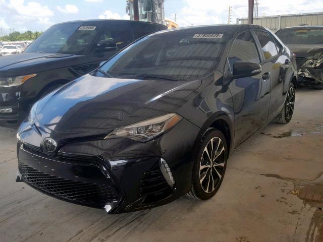Photo 2 from auction – 2017 TOYOTA COROLLA L with VIN 5YFBURHE2HP682267