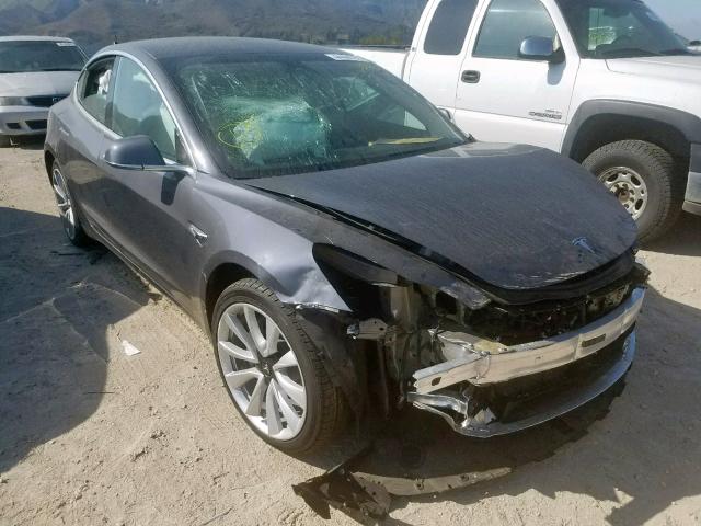 TESLA MODEL 3 2019 with VIN 5YJ3E1EAXKF338256 - Photo from auction
