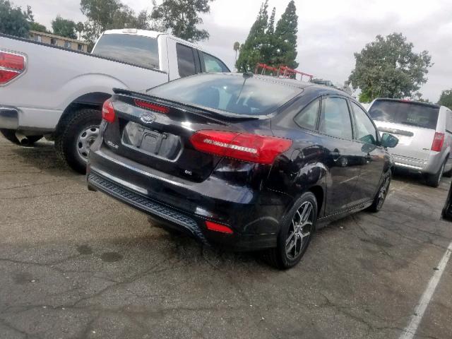 Photo 4 from auction – 2016 FORD FOCUS SE with VIN 1FADP3F2XGL254059