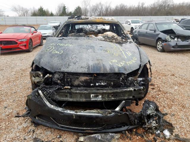 Photo 9 from auction – 2014 FORD TAURUS SHO with VIN 1FAHP2KT6EG140804