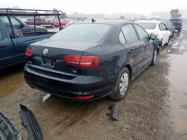 Photo 4 from auction – 2016 VOLKSWAGEN JETTA S with VIN 3VW267AJ2GM258483