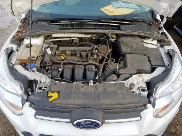 Foto 7 de la subasta – 2014 FORD FOCUS SE con VIN 1FADP3K28EL123909