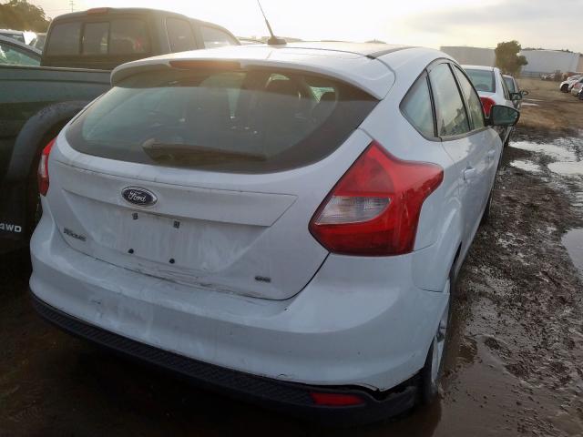 Foto 4 de la subasta – 2014 FORD FOCUS SE con VIN 1FADP3K28EL123909